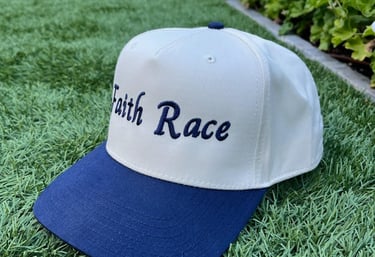 The Admiral Faith Race hat on grass
