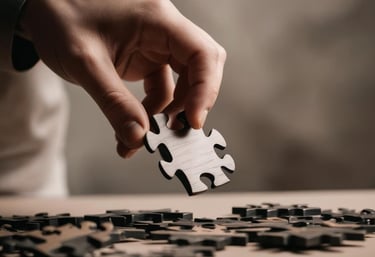 a person holding a piece of puzzle puzzle piece