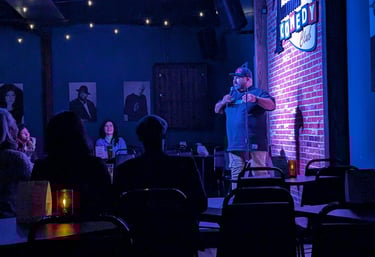 Joke Daddy on stage at the Tacoma Comedy Club