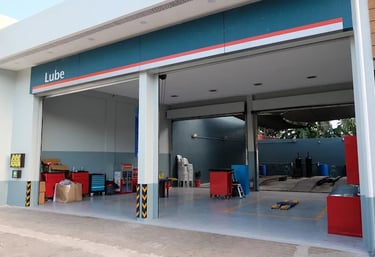 a garage with a lot of furniture and a lot of furniture