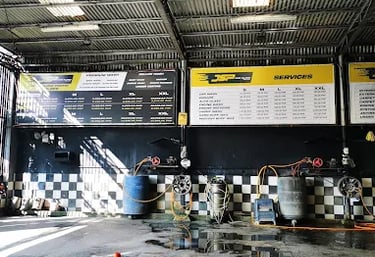 a garage with a checkered floor and a checkered floor