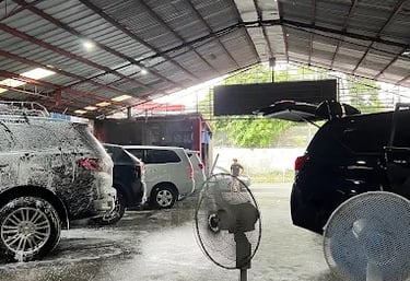 a car washer is parked in a garage
