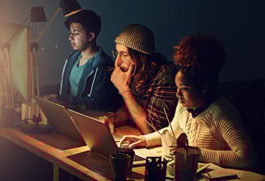 A diverse team working remotely on a digital-first web design platform, reflecting expansion beyond