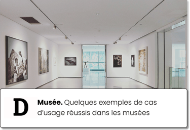 a museum with a large number of paintings on display