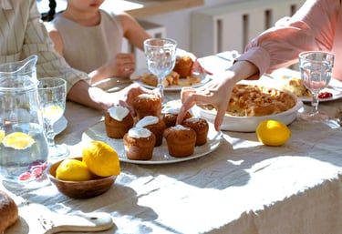 a family gathering at a table with lemonade and lemonade