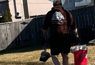 pet-waste-removal-employee-cleaning-clients-yard