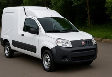 Fiat Fiorino branca estacionada em rua arborizada, vista frontal em ambiente urbano