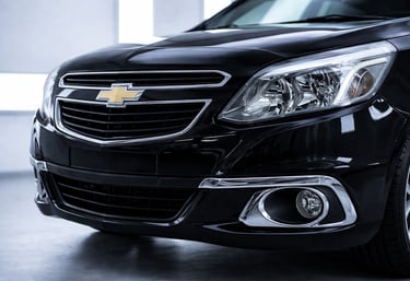 Chevrolet Agile 2014 frontal detalhe da grade e farol com foco em design e acabamento do modelo usad