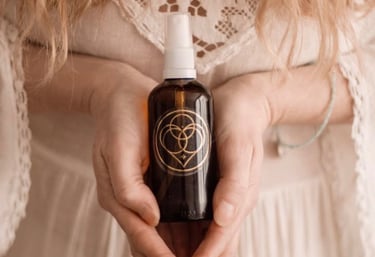 Sacred water spray held in hands