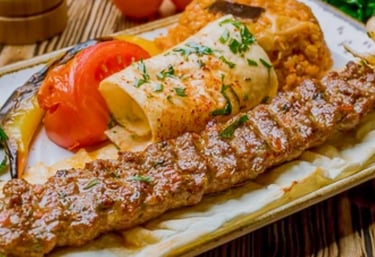 a plate of food with meat and vegetables