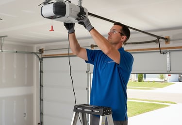 Photo of garage door technician repairing a garage door opener