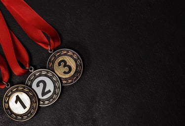 Imagem de medalhas para ilustrar guia sobre o Chambers Fintech