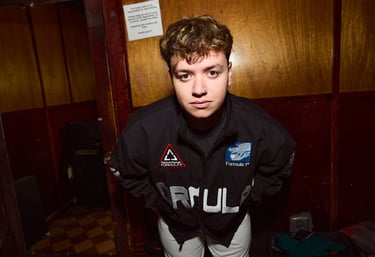 musician zachary booth posing for the camera