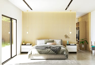 Une chambre avec un lit et une grande fenêtre