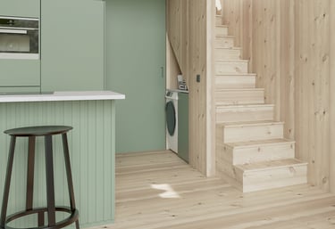 a kitchen with a washing machine and a washing machine