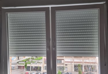 a window with blinds and blinds in a room