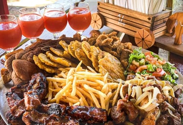 a plate of food with a glass of wine and a glass of wine
