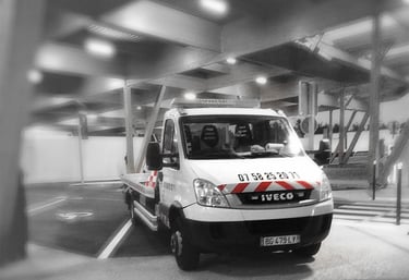 a white van parked in a parking lot