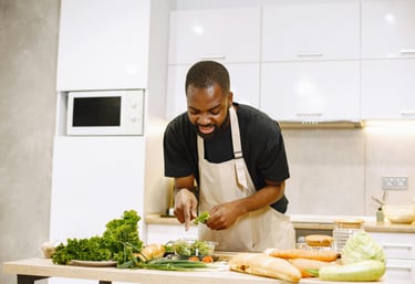 A man preparing healthy foods in the kitchen