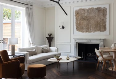 a living room with a fireplace and a couch