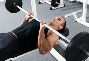 a man is doing a barbell exercise on a bench, close grip bench press
