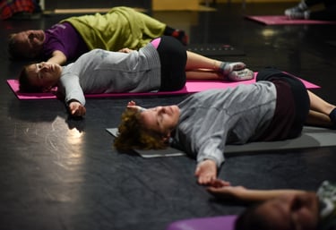 People doing an 'Awareness Through Movement' lesson form the Feldenkrais Methodt