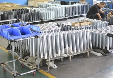 Bearings or bushings installed into barbell sleeves for rotation performance