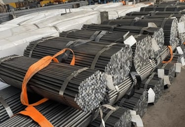 Raw steel materials prepared for barbell manufacturing