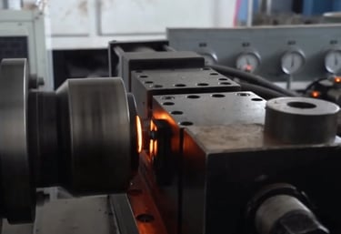 Barbell sleeves welded onto shafts during assembly process