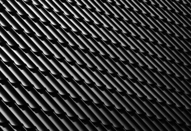 a black and white photo of a wall of a building