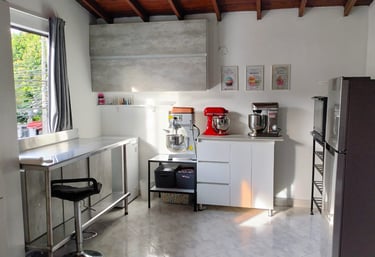 a kitchen with a counter top and a coffee maker