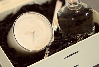 a candle with a candle in a box