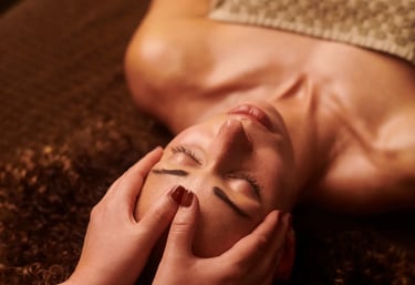 a man is getting a facial mask with a woman's face