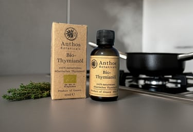 a package and a bottle of essential thym oil
