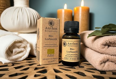 a bottle of laurel bay essential oil sitting on a table