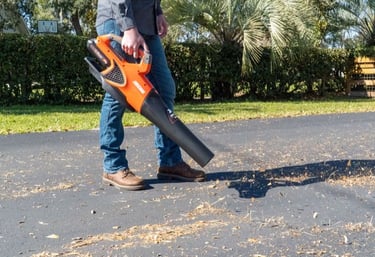 Clearing driveway of any debris in preparation for sealcoat