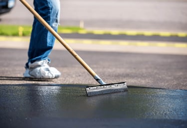 Seal coating parking lot using professional grade emulsion sealant