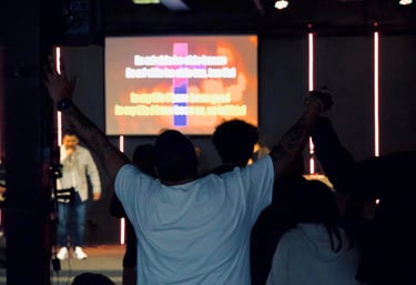 man raising his hands
