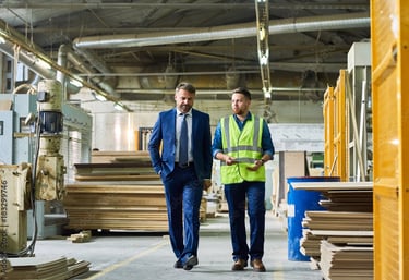 businessman is walking in a factory