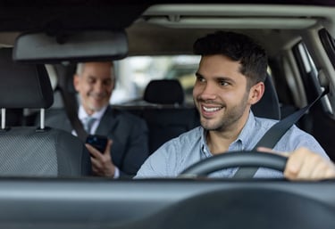 Executive is riding a car