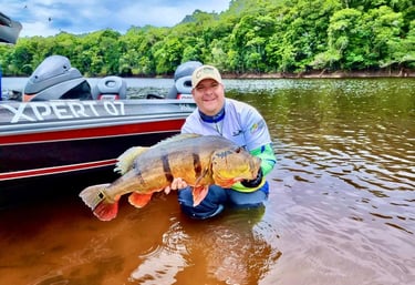 a man holding a fish
