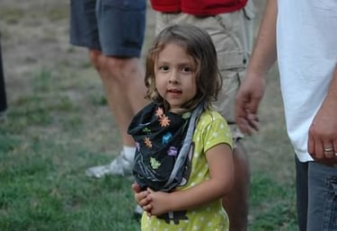 a little girl in a playing fun games