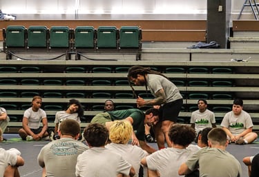 Coach demonstrating technique