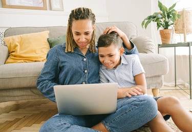 Mother and son sitting on the floor at home exploring 10-year fixed vs variable mortgage options