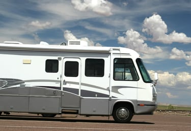 a motorhome rv parked in a parking lot