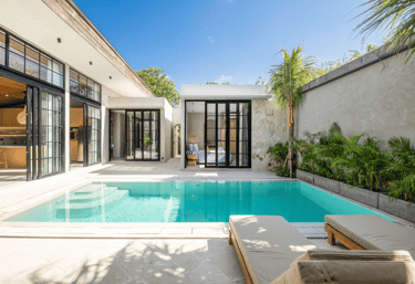 European inspired villa with master bedroom facing the turqoise blue swimming pool