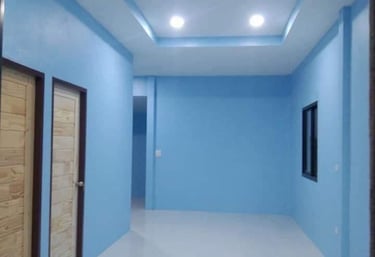Finished hallway with painted walls and drywall ceiling with recessed lighting by Garnet Painting & Remodeling GA
