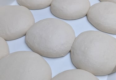 hand made pizza dough using flour imported from Italy