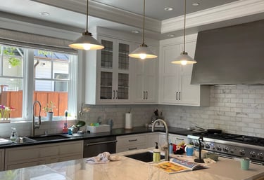 a kitchen with a large island and a large island