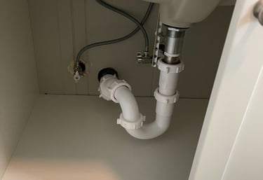 a sink with a sink and a toilet